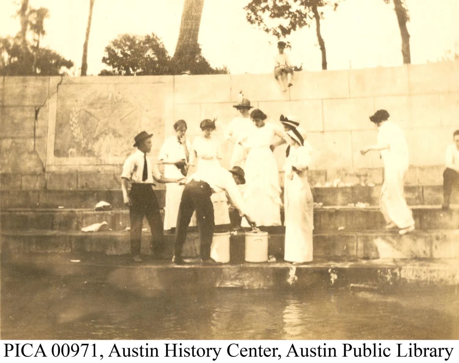 People gathering water at Eliza Spring in the early 1900s