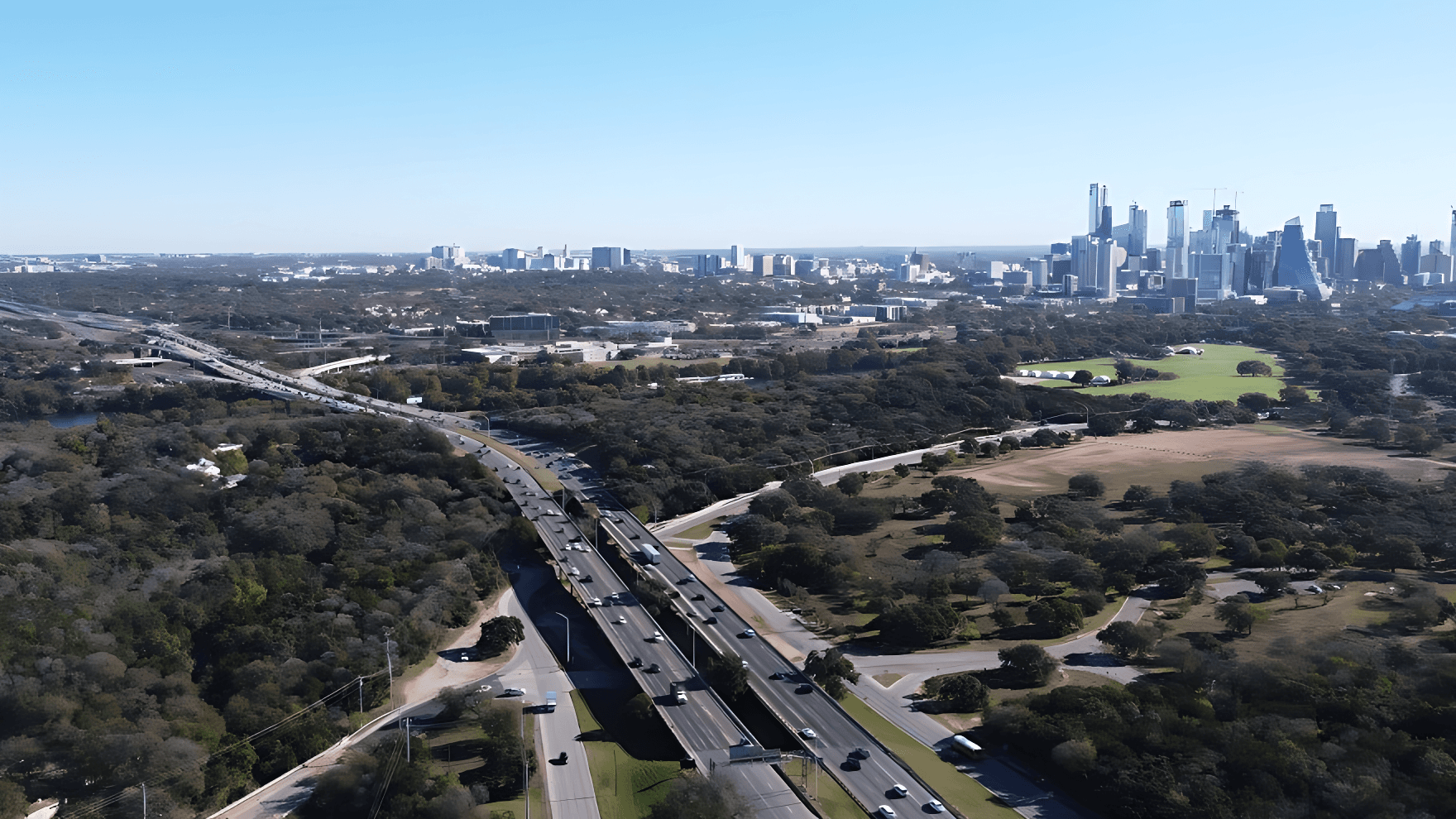 Aerial view of Zilker Park and the downtown Austin skyline