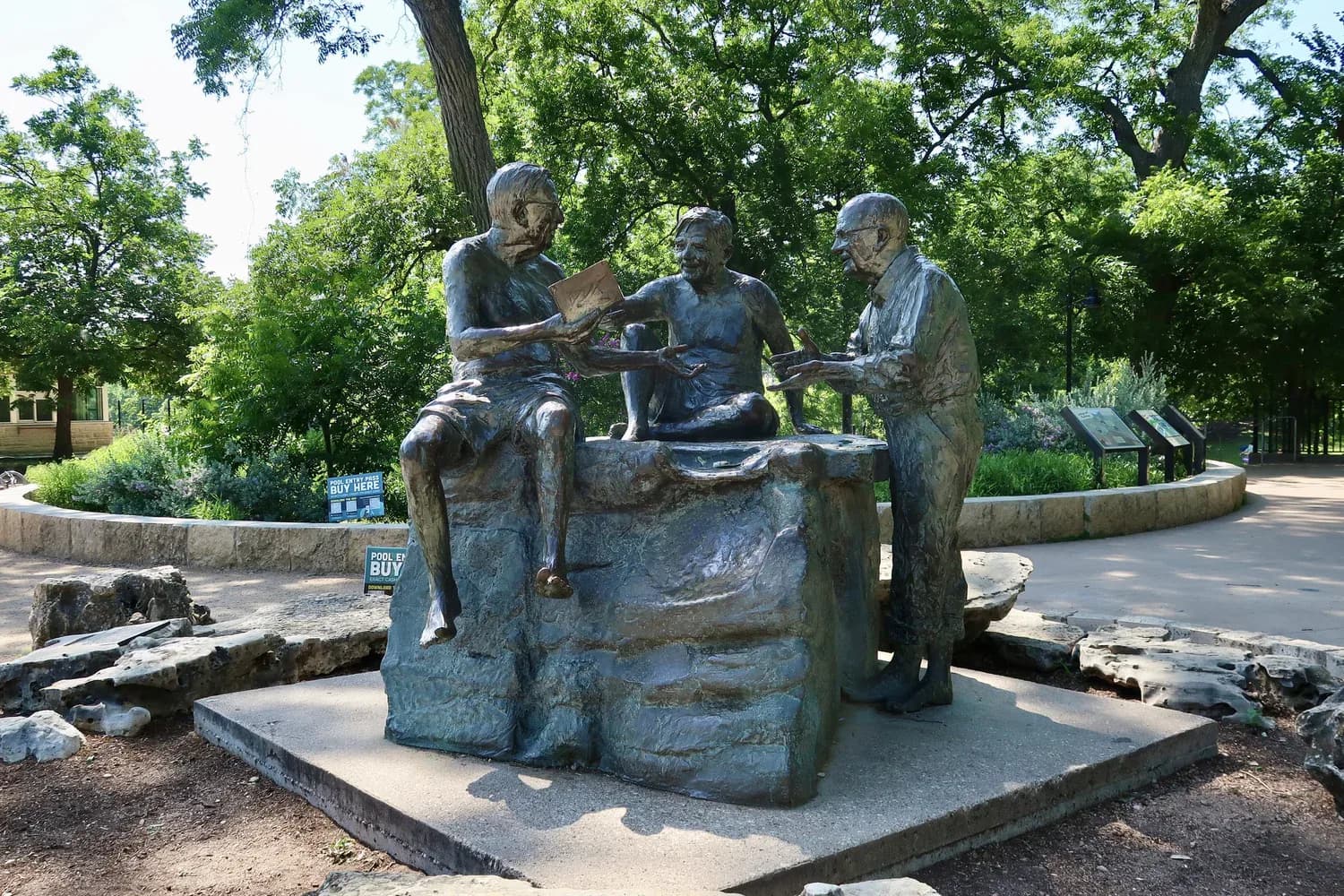 The Philosophers' Rock bronze sculpture in Zilker Park's gardens
