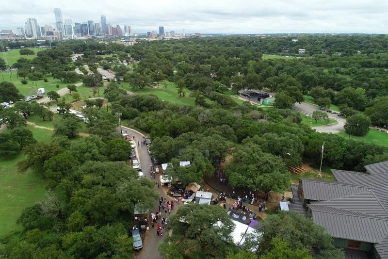 Aerial drone view of Zilker Park with the Austin skyline beyond