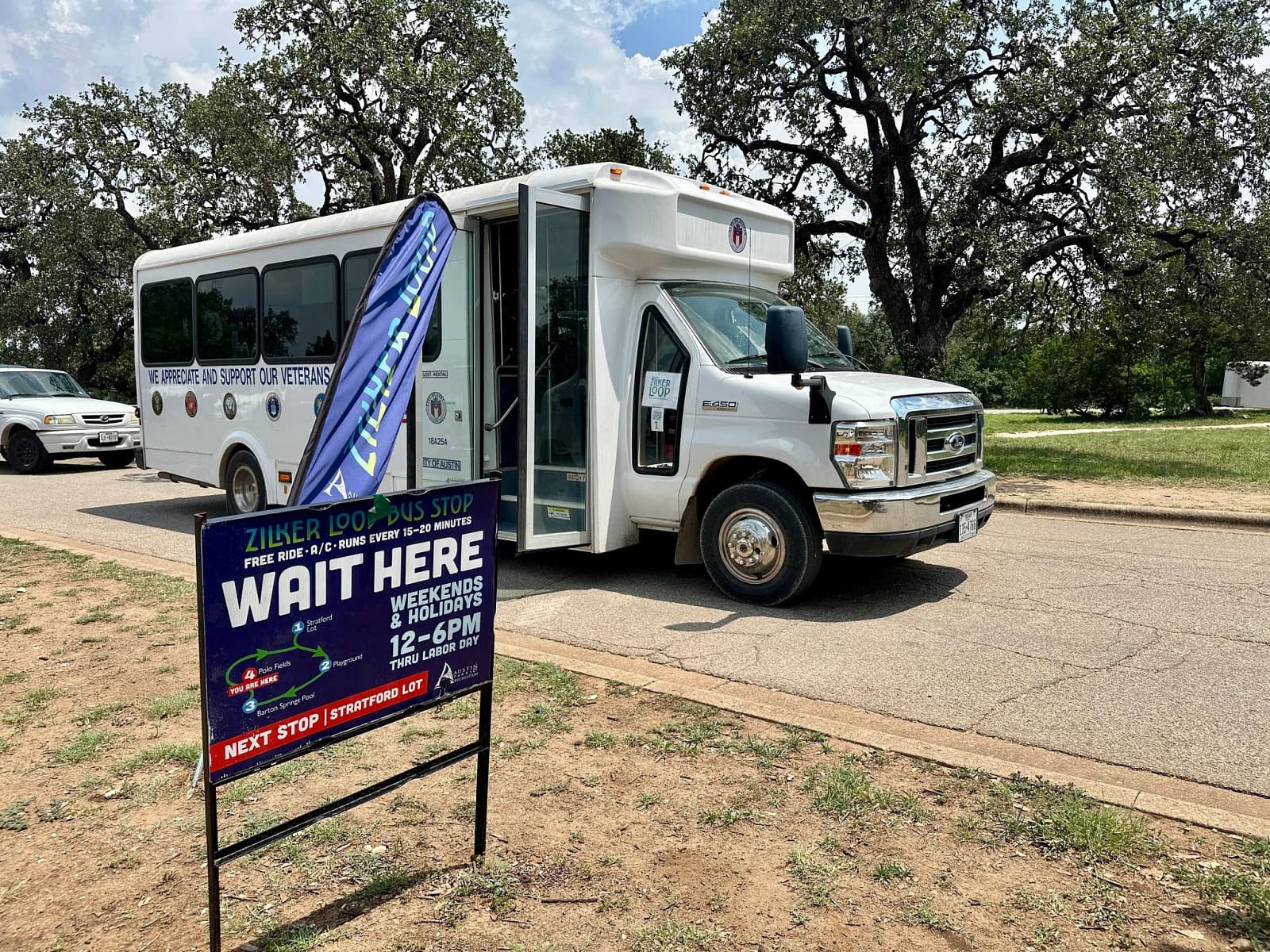 The free Zilker Loop shuttle waiting at its Zilker Park stop